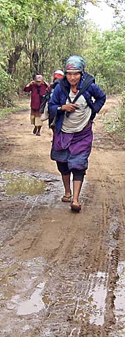 Akha Women on the Way to their Village by Asienreisender